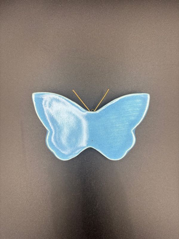 Sommerfugl lys blå liten